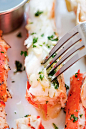 Garlic Lemon Butter Crab Legs - crazy delicious king crab legs in garlic herb and lemon butter. This crab legs recipe is so good you want it everyday | rasamalaysia.com