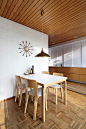 Alvar Aalto dining table (model 82B) and (chairs model 66) designed in 1935. Paavo Tynell pendant light, ca.1950s