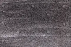 艺术灰色背景由石墨铅笔画。颜色深黑色填充在牛皮纸上。
