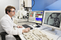 Caucasian scientist using computer in laboratory by Gable Denims on 500px