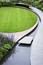 Water feature, bespoke paving and lawn - what more could you want in a small city garden?