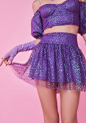 Sugar Thrillz Broken Spell Glitter Skirt because you can turn anyone into a beast. Be a beauty in this glittery tulle mini skirt that has a layered construction and a high waist fit.