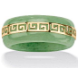 A beautiful green jade ring with a gold Greek design: 