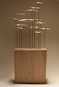 Bandada 1 (Flock 1) | 23 x 59 x 7 cm | Latón, varilla de hierro y roble (Brass, iron sticks and oak) | Pieza seriada de 20 unidades (20 pieces) | 2013  http://www.marinaanaya.com