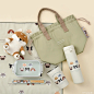 Photo by りぶはあと on May 05, 2023. May be an image of water bottle, placemat, hand cream, pouch, pencil case and text.