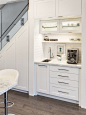Example of a small trendy single-wall dark wood floor open concept kitchen design in Other with an undermount sink, shaker cabinets, white cabinets, white backsplash, subway tile backsplash, marble countertops, stainless steel appliances and an island