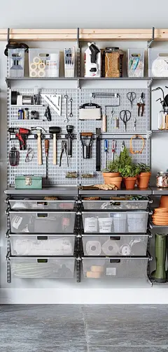Elfa Garage Solutions are customizeable and strong. They can store tools, plants, mulch, lawn equipment, holiday decorations and more!