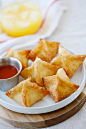 Best crab rangoon on a white plate, ready to serve.