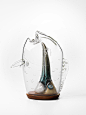 Unique Glass Pieces by Tom Moore : Australian artist Tom Moore creates beautiful award-winning glass sculptures with a unique approach.

"His animal-shaped transparent bell jars are almost a metre tall and require two skilled assistants to help with 