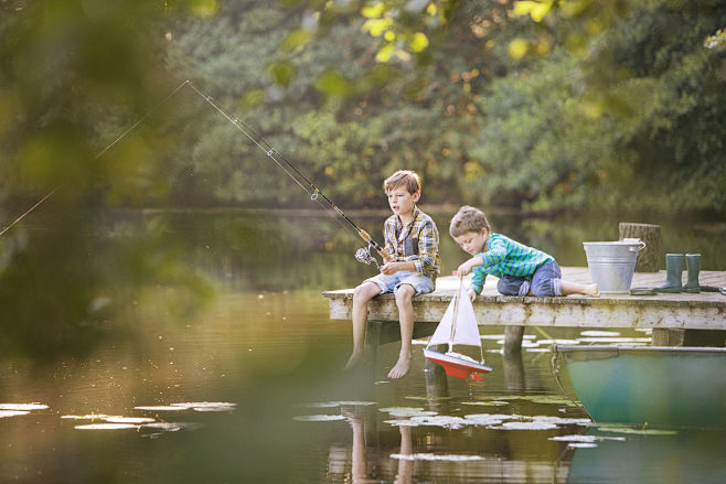 Boys fishing and pla...