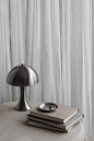 Metal desk lamp Zara Home - Silver Jewelry - Linen Tablecloth - Books