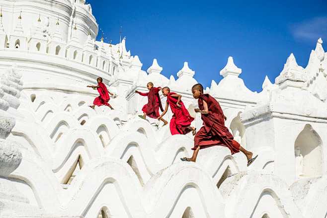 Asian monks running ...