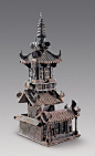 Pottery model of a two story mansion about 3.4 feet tall may give clues as to what Chinese houses may have looked like during the Three Kingdoms Period. China, circa 220 AD