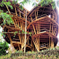 Ginormous bamboo house designed by @alorahardy Green village bali. Note the tiny man in lower left corner