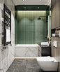 The solid stone wall and tiling in the shower make the room feel bigger.