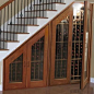 wine cellar in wasted space under stairs