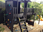 Outside play in this fun fort with bridge & rockwall. #play #cubbies #cubbyhouse