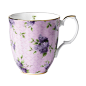 Royal Albert 100 Years of Royal Albert 1990 Hartington Lane Mug. Blending two of the most popular patterns from the archives, this 1990 Hartington Lane Mug is decorated with beautiful floral sprays from the Lilac Lane pattern with the background pattern o