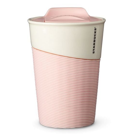 A ceramic cup featur...