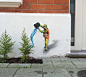 城市工人的秘密和滑稽的生活的街头涂鸦作品
