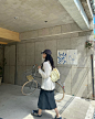 Photo by Minseo on May 06, 2024. May be an image of 1 person, bicycle, racket, cornflower and text.