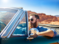 bearded guy in desert sitting in cool vintage car