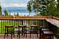 Custom made hand forged iron forms a solid but decorative railing around this lovely outdoor bar and seating area. Not wanting to obstruct their gorgeous ...: 