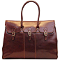 Lugano Duffle : Lugano leather duffle bag comes in four colors - Vecchio Brown, Olive (honey) Brown, Tuscan Red and Black. Made in Italy. 14" h x 9 " w x 20 " l Shoulder Drop - 9 " Italian