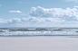 white clouds over the sea