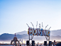 Burning Man is anything but boring : The BORiNG sign, created by Camp BORiNG from Mill Valley, California, and handpainted and fabricated from metal, represents the irony implicit in the Burning Man event itself.