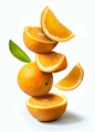 This may contain: oranges stacked on top of each other with leaves