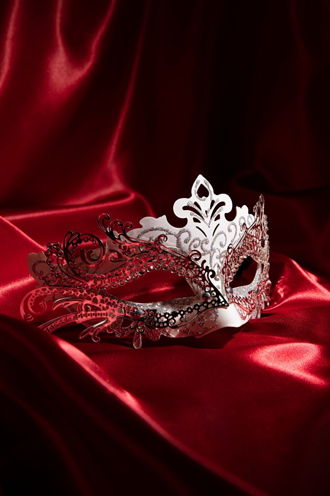 Theater mask on red ...