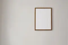 点击来源直接获取大图文件 |Vertical wooden picture frame mockup hanging on beige wall. Poster mock-upframe on pastel background in sunlight. Home interior with soft shadow, empty copyspace. Art display concept. Minimal interior