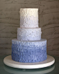 Ombre Wedding Cake : WCA014  This wedding cake makes use of varying shades of lavender tinted meringue buttercream to create a unique and festive design. The top and bottom tiers are double-stacked layer cakes, which add to the drama and height, not to me