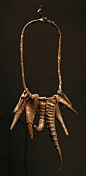 West Africa | Iron, goat and gazelle horn talismans on a fiber and leather necklace