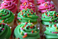 pink and green cupcakes. by beLIEveyourheart