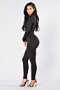 Frisky Feline Jumpsuit - Black : 
Available in Black, Nude, Charcoal, Olive
Mock Neckline
Long Sleeve
Back Zipper 
Skinny Leg
95% Polyester, 5% Spandex
