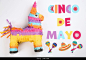 Cinco de Mayo festive poster. Bright funny pinata on white background, top view Stock Photo