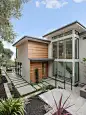 Photo of a modern full sun garden in San Francisco with a garden path and concrete paving.