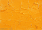颜料肌理-橘色油漆涂抹的肌理效果设计背景图片