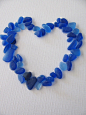 Sea glass heart - pretty way to work in accent colors (like the royal, indigo, Sodalite Blue or Dazzling Blue shown here) for your wedding, party, or other event decorating!