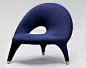 A rarely-seen but exemplary example of mid-century Scandinavian art furniture, Swedish designer Folke Jansson's 1955 Arabesk Chair.