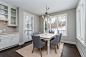 Mid-sized farmhouse dark wood floor and brown floor kitchen/dining room combo photo in Minneapolis