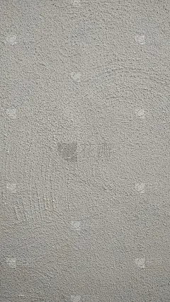 用灰泥涂成灰色的墙壁碎片。特写镜头。