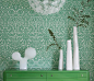 [] #合肥装修公司#选择比较有趣味性的壁纸，这样就可以与家居饰品相搭配，衬出不一样的感觉。例如这款的绿色小清新的壁纸，配合着白色的摆设，营造出干净的有气质的氛围。