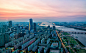 Sunset over Seoul : The skyscrapers of Seoul light up as evening comes on in South Korea.