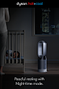 an ad for dyson hot and cool featuring a woman sleeping in her crib
