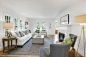 Example of a mid-sized transitional formal light wood floor living room design in Minneapolis with white walls, a standard fireplace, a tile fireplace and no tv