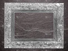 灰框复古相框在大理石石墙的背景