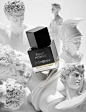 Greek statues and fragrance bottles shot by London still life photographer Josh Caudwell. YSL Pour Homme perfume bottle and roman statues.